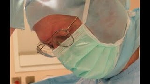 Dr. Robert McLain performing spine surgery