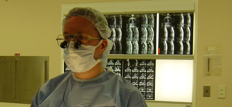 Spine surgeon at work - concentrating.
